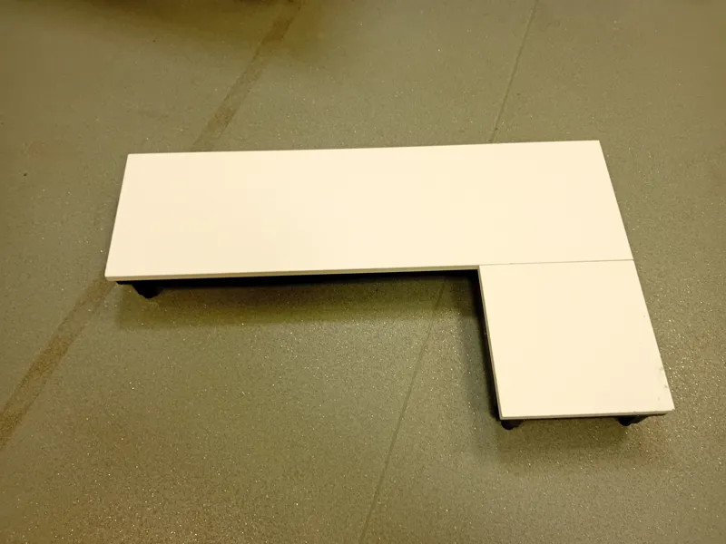 White L-Shaped Desk/Workstation with Blue Frame Stand