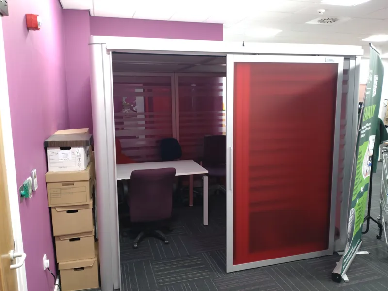 Mobile Meeting Pod with Red Glass Partitions